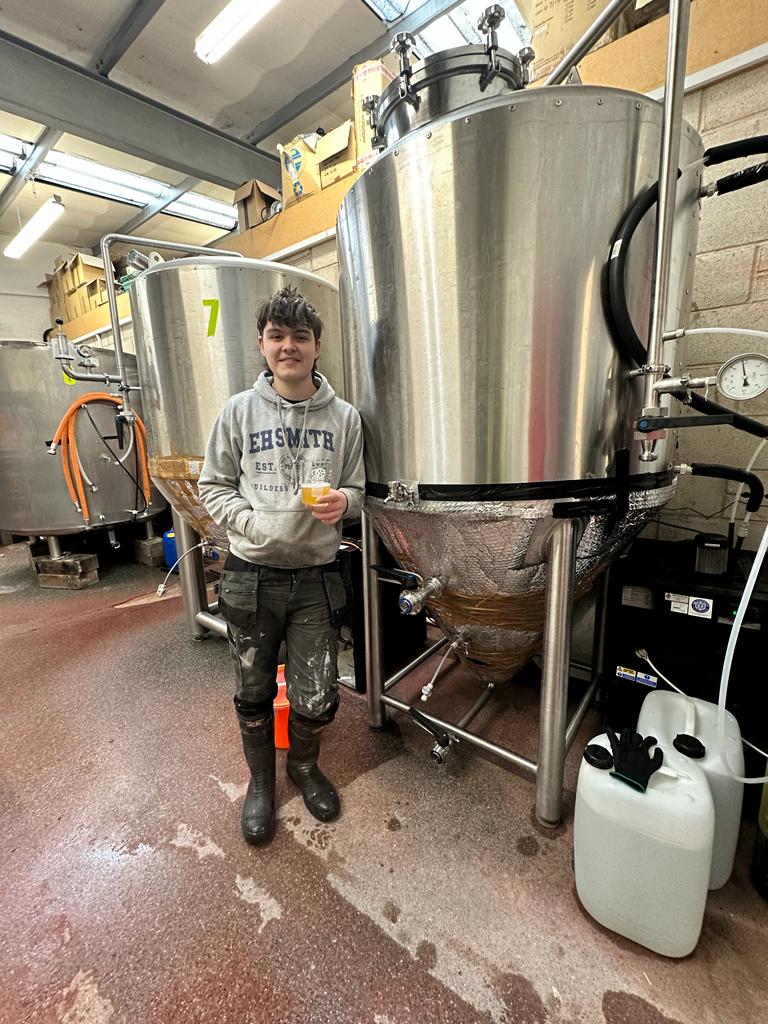 Jacob Next to a brewing machine